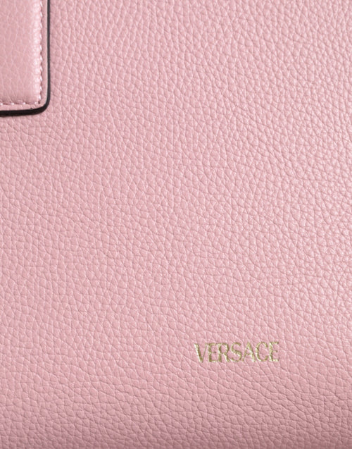 Versace Pinke Crossbody-Tasche mit kleinem Griff aus genarbtem Kalbsleder